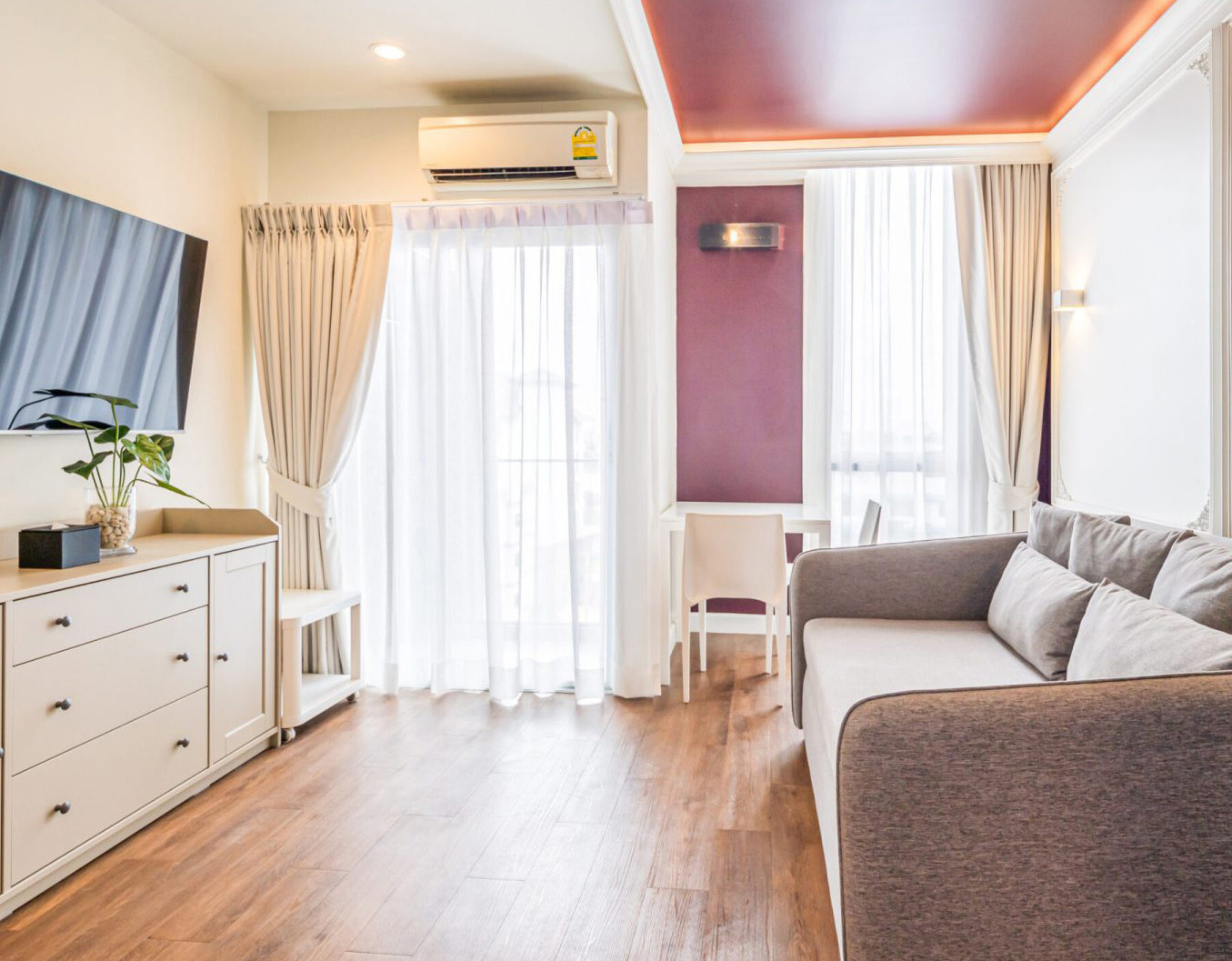 Spacious living room in suite at Red Crocodile Hotel – mobile view near BITEC