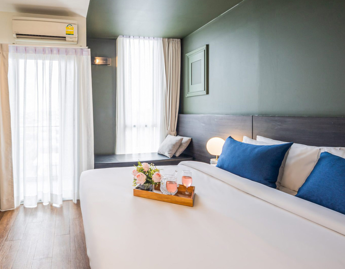 Superior room with king bed and natural light at Red Crocodile Hotel – mobile view